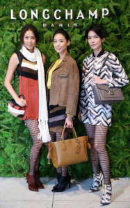 Longchamp舉行新品發表會，名模特兒林又立（左起）、林可彤、劉欣瑜展演最新服裝。p1117-a5-01