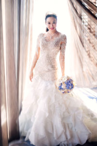 港星鍾麗緹日前在北京與小12歲的中國大陸男模張倫碩舉行婚禮，鍾麗緹穿上婚禮白紗，美麗動人。p1134-a5-03